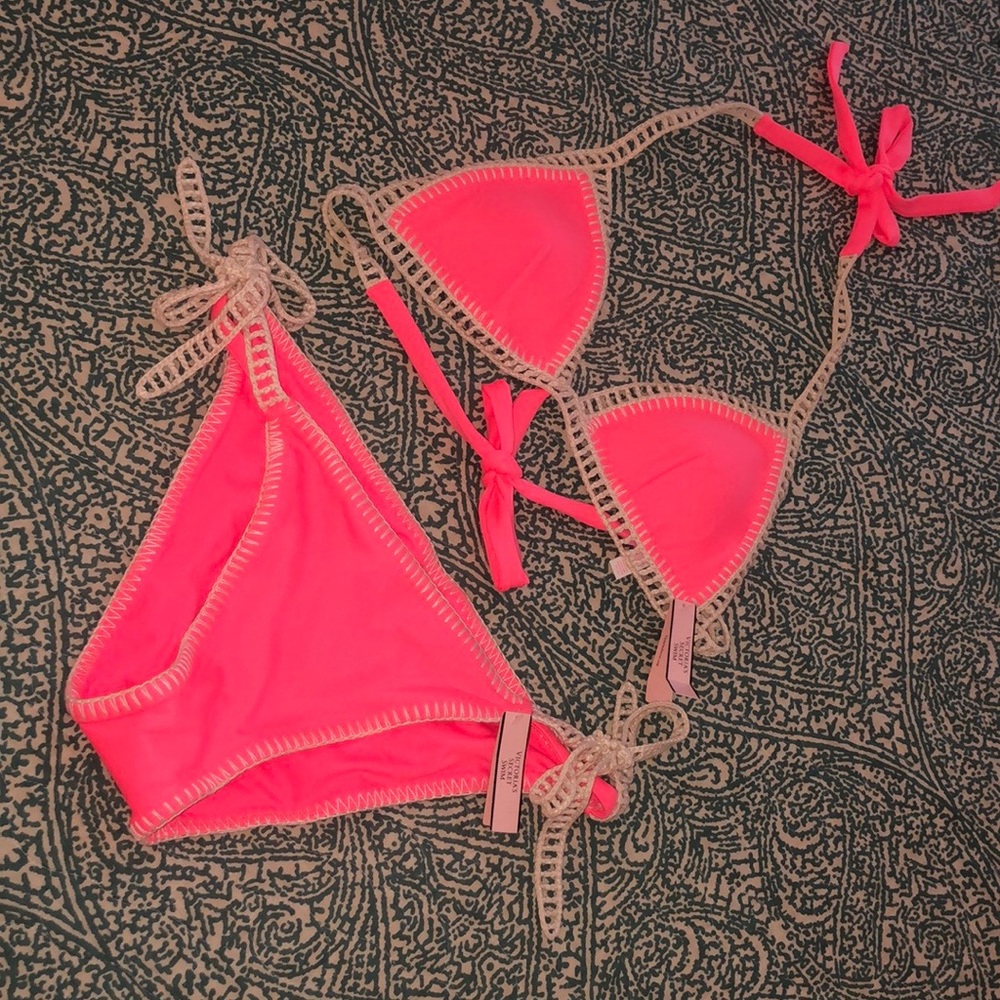 Two piece string bikini top w matching bottom.